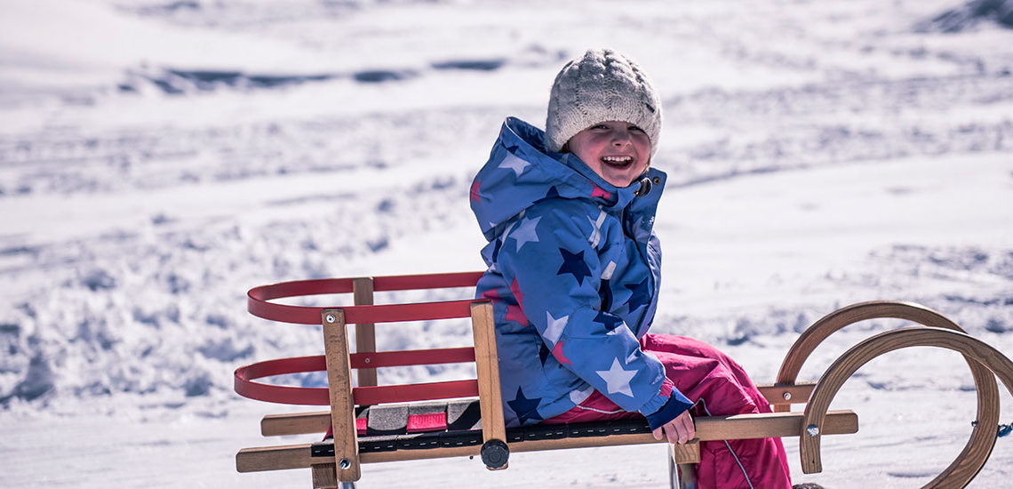 Rodeln im Winterurlaub in Gastein, Salzburg